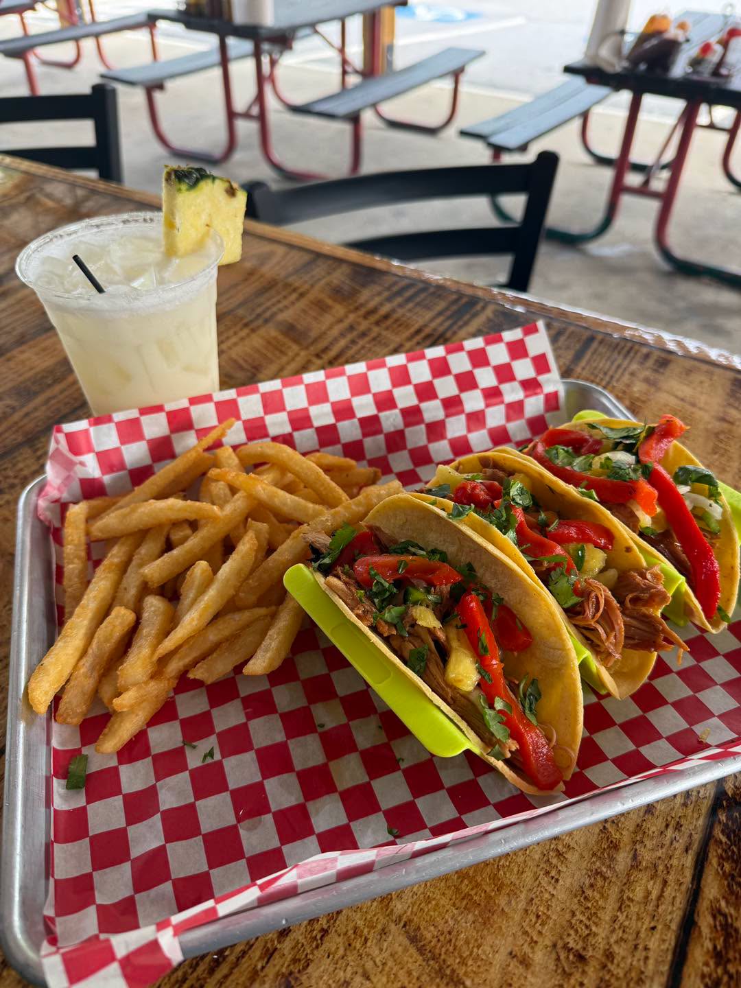 Tacos, fries and a drink at PiNK PiG BBQ